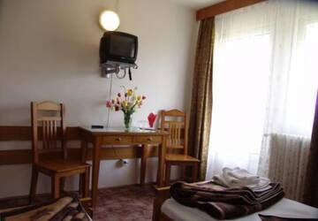 Фото номера Двухместный номер с 2 отдельными кроватями Отель Hotel Hefaistos - Sovata г. Совата 10