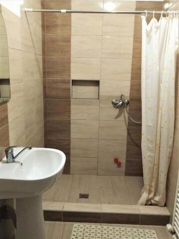 Фото номера Апартаменты с видом на бассейн Курортные отели Apartamente Pallós Vendégházak г. Совата 3
