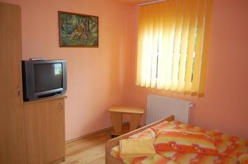 Фото номера Двухместный номер с 1 кроватью Дома для отпуска Casa Kiss г. Совата 2