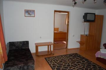 Фото номера Апартаменты с 2 спальнями Дома для отпуска Casa Kiss г. Совата 4