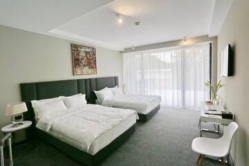 Фото номера Семейный номер Отель Fabesca Boutique Hotel &amp; SPA г. Совата 4