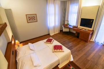 Фото номера Двухместный номер с 1 кроватью и балконом Отель Hotel Pacsirta г. Совата 4